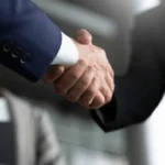 businessman-handshake-teamwork-business-merger-600nw-2478343593